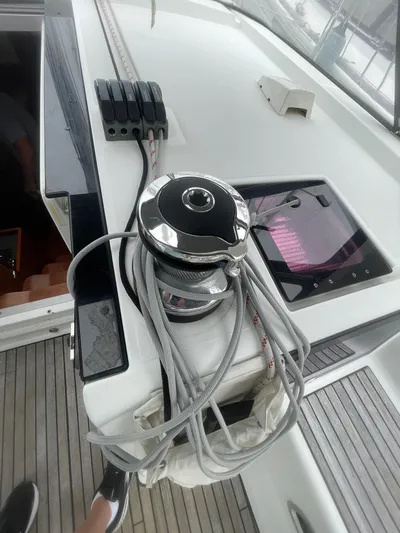 Joie De Vivre Yacht Photos Pics 2014 Beneteau Oceanis 48 yacht deck with winch and ropes.