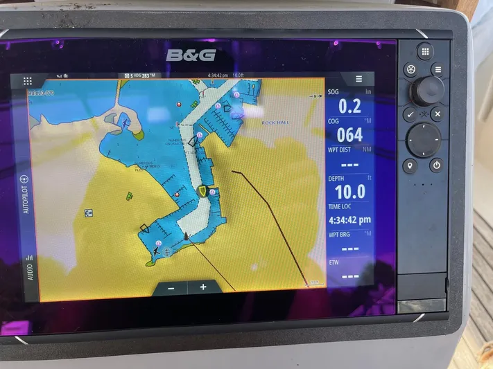 Joie De Vivre Yacht Photos Pics Navigation display on a 2014 Beneteau Oceanis 48 showing nautical chart and vessel data.