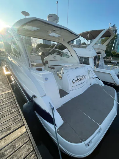  Yacht Photos Pics 2009 Cruisers Yachts 360 Express docked, showcasing sleek design and spacious deck.