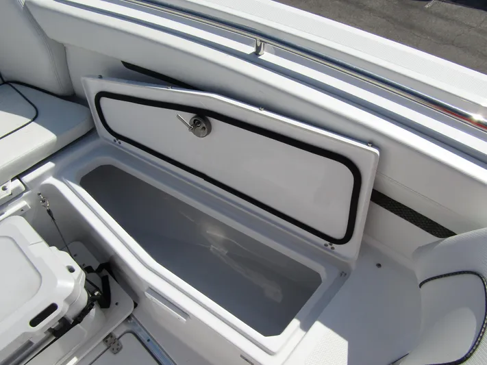  Yacht Photos Pics 2024 Wellcraft 263 Fisherman boat storage compartment.