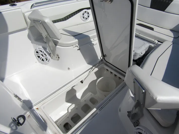  Yacht Photos Pics 2024 Wellcraft 263 Fisherman boat interior with open storage compartment.