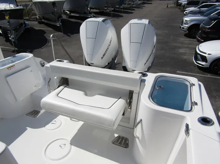  Yacht Photos Pics 2024 Wellcraft 263 Fisherman boat with dual Mercury engines and foldable seating.