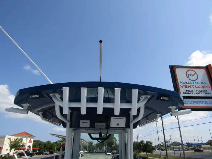  Yacht Photos Pics 2024 Wellcraft 263 Fisherman boat with T-top and rod holders.