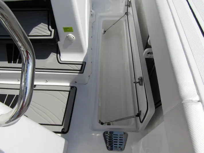  Yacht Photos Pics 2024 Wellcraft 263 Fisherman boat interior storage compartment.