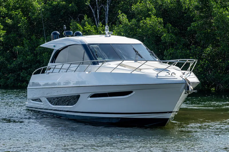 Ciento Siete Yacht Photos Pics 2020 Maritimo X50 luxury yacht cruising on a serene waterway.