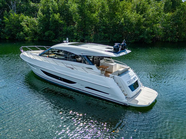 Ciento Siete Yacht Photos Pics 2020 Maritimo X50 luxury yacht cruising on a serene waterway.