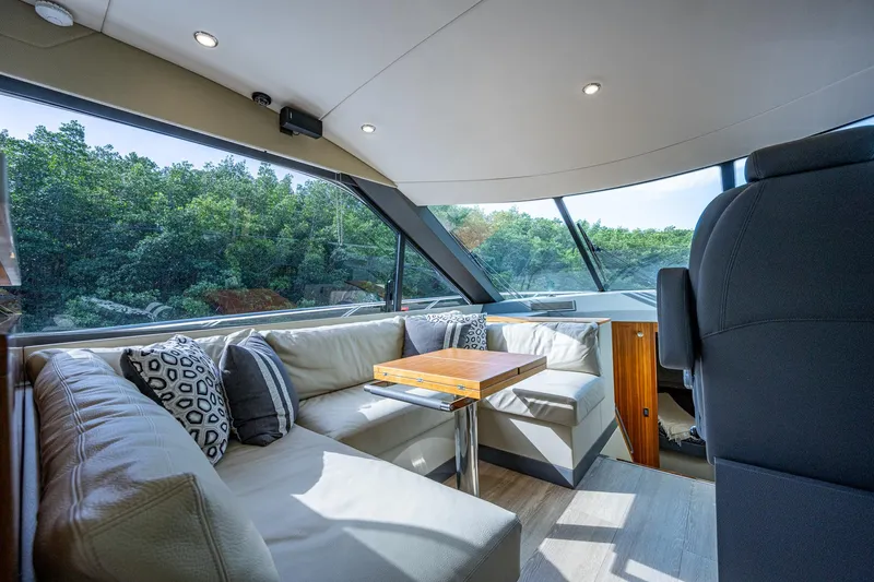 Ciento Siete Yacht Photos Pics Interior of 2020 Maritimo X50 yacht with luxurious seating and large windows.