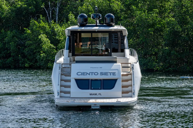 Ciento Siete Yacht Photos Pics Rear view of 2020 Maritimo X50 yacht named Ciento Siete in Miami waters.