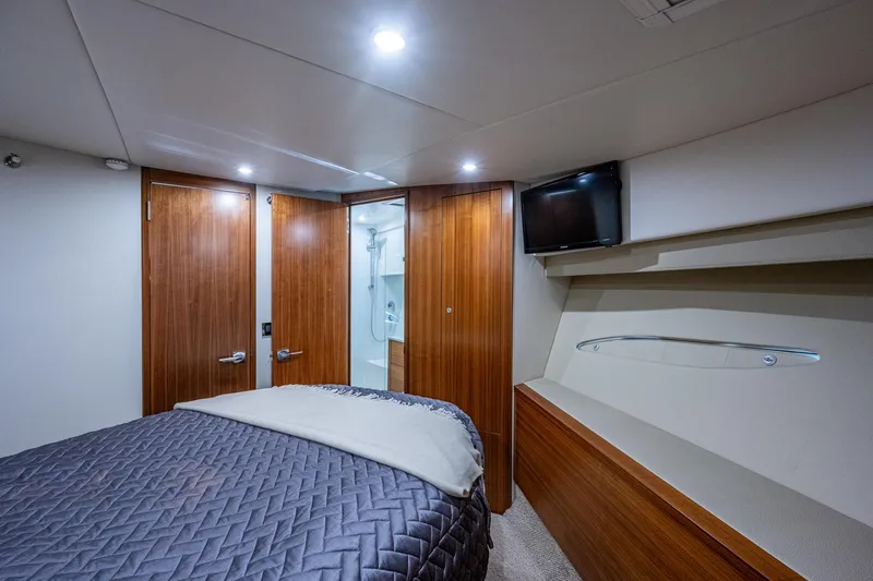 Ciento Siete Yacht Photos Pics Luxurious bedroom interior of 2020 Maritimo X50 yacht with ensuite bathroom.