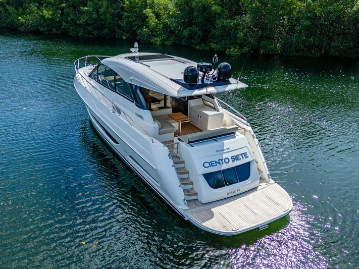 Ciento Siete Yacht Photos Pics 2020 Maritimo X50 luxury yacht cruising on a serene waterway.
