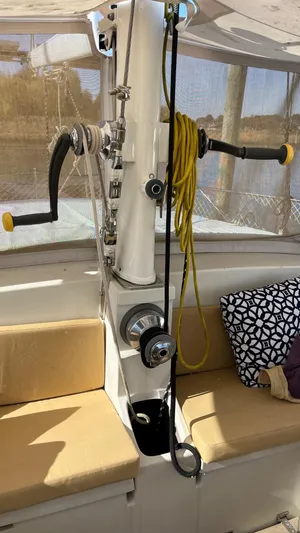 Indigo Yacht Photos Pics Interior of 1996 Amel Super Maramu-53 sailboat with winches and seating area.