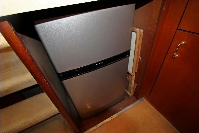 Yacht Photos Pics Compact refrigerator in 2000 Ocean Express Sportfisher 40 yacht interior.