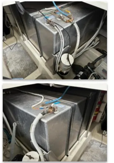 Flying Lady Yacht Photos Pics Engine compartment of 2004 Carver 570 Voyager Pilothouse with visible fuel tanks and hoses.