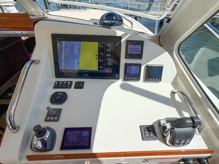 Moncri Yacht Photos Pics Helm of 2012 MJM 36z Downeast boat with navigation and control systems.