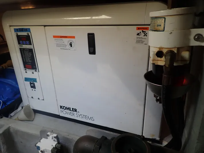 No Quarter Yacht Photos Pics Kohler power system in 2006 Mainship 34 Trawler engine room.