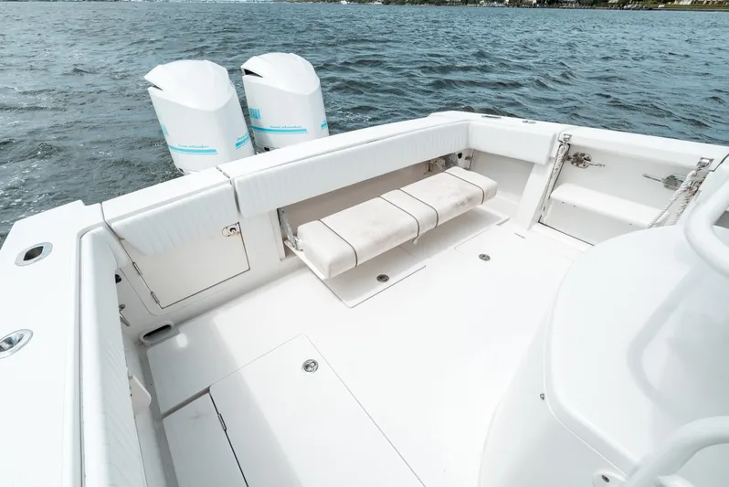  Yacht Photos Pics 2012 Jupiter 34 FS boat deck with twin outboard engines on water.