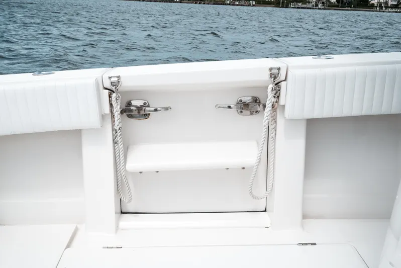  Yacht Photos Pics 2012 Jupiter 34 FS boat stern with ropes and water view.