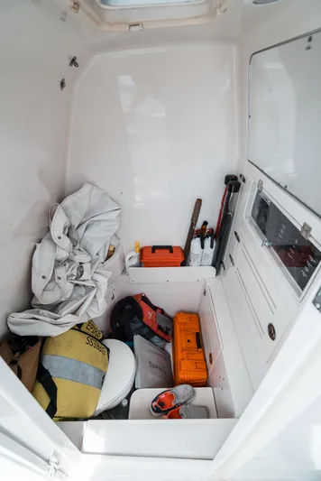  Yacht Photos Pics Interior storage of 2012 Jupiter 34 FS boat with equipment and supplies.