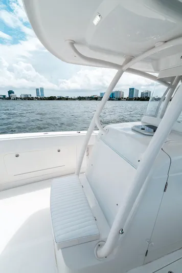  Yacht Photos Pics 2012 Jupiter 34 FS boat interior with ocean view and city skyline in the background.