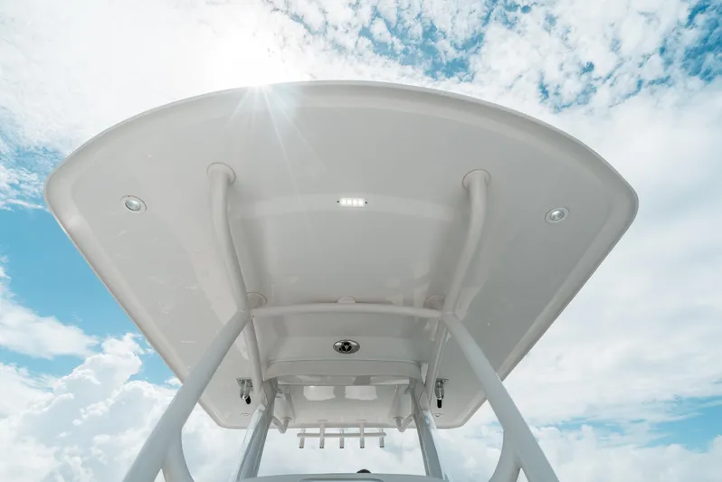  Yacht Photos Pics 2012 Jupiter 34 FS boat canopy against a bright blue sky.