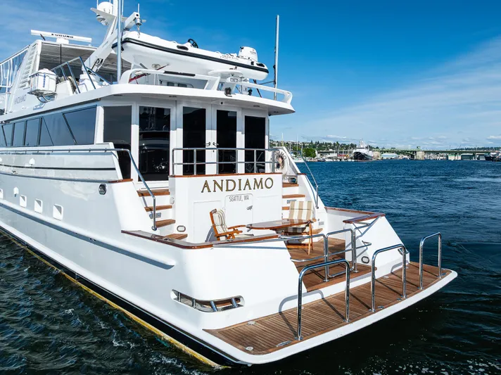 Andiamo Yacht Photos Pics Luxury yacht Broward 102, 1991 model, named "Andiamo" on the water.