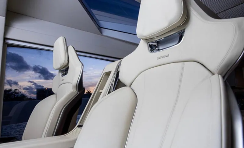  Yacht Photos Pics Luxurious interior seating of 2019 Numarine 78 yacht with panoramic window view.