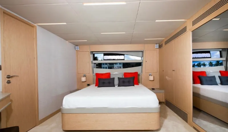  Yacht Photos Pics Luxurious bedroom interior of 2019 Numarine 78 yacht with modern design and elegant decor.
