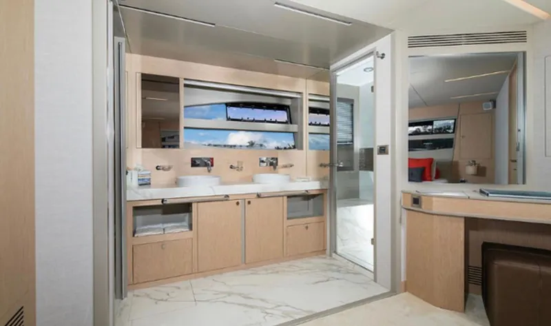  Yacht Photos Pics Luxurious bathroom interior of 2019 Numarine 78 yacht with dual sinks and modern design.