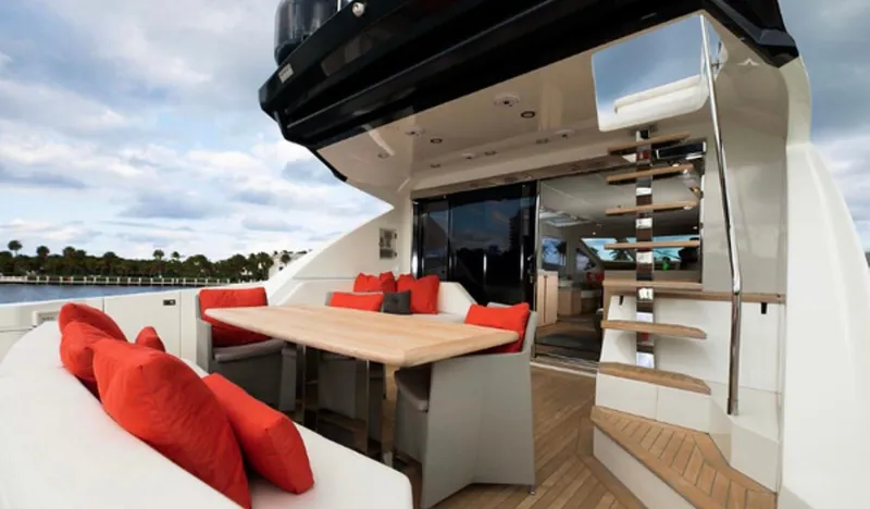  Yacht Photos Pics Luxurious 2019 Numarine 78 yacht deck with seating, table, and staircase.