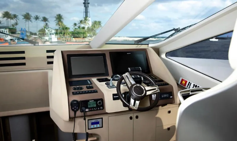  Yacht Photos Pics Cockpit of 2019 Numarine 78 yacht with modern controls and ocean view.