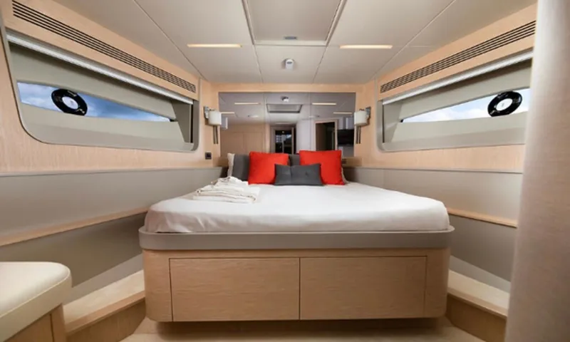  Yacht Photos Pics Luxurious bedroom interior of 2019 Numarine 78 yacht with modern design and cozy bedding.