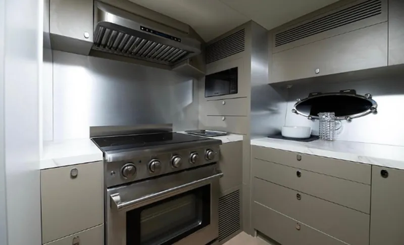  Yacht Photos Pics Modern kitchen in 2019 Numarine 78 yacht with stainless steel appliances and sleek cabinetry.