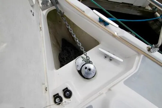  Yacht Photos Pics Anchor chain and winch on 2001 Hunter Passage 420 sailboat deck.