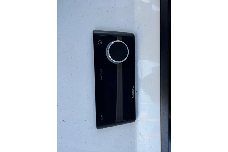  Yacht Photos Pics Fusion marine audio system on 2025 Intrepid 327 Cuddy boat dashboard.