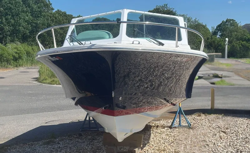  Yacht Photos Pics 2015 Hunt Yachts Harrier 25 Sport on display, front view, outdoors.