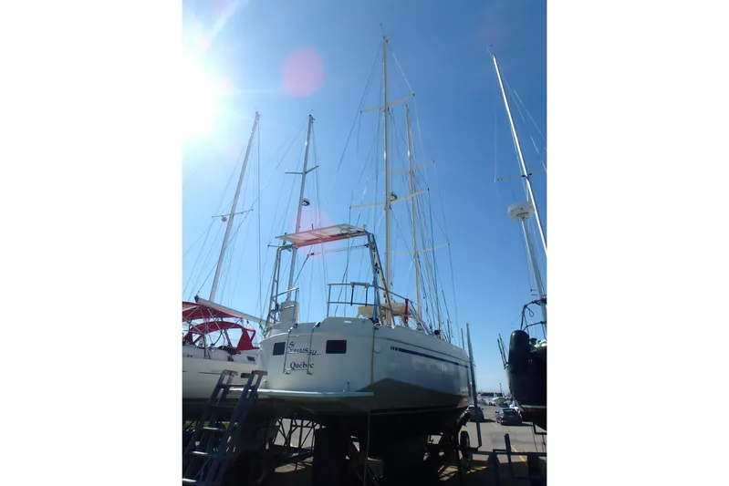 Si J'avais Su Yacht Photos Pics Sailboat Gilbert Caroff Lex Eterna 47, 2017 model, docked under clear blue sky.