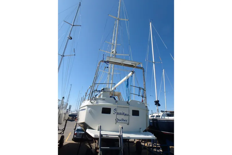 Si J'avais Su Yacht Photos Pics Custom Gilbert Caroff Lex Eterna 47 sailboat, 2017 model, docked with clear blue sky.