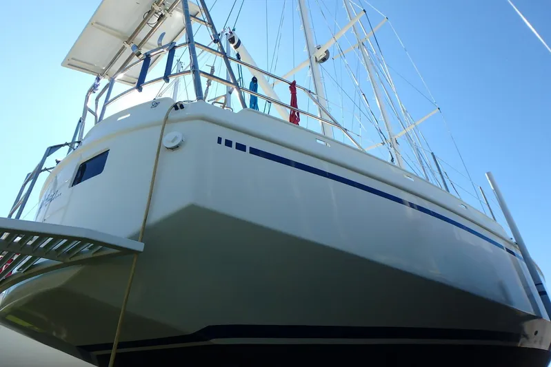 Si J'avais Su Yacht Photos Pics Custom Gilbert Caroff Lex Eterna 47 sailboat, 2017 model, viewed from below against blue sky.