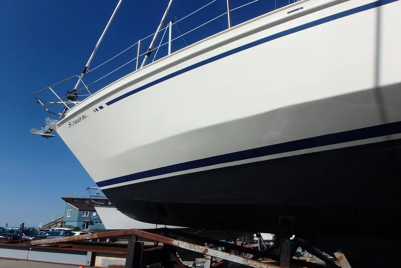 Si J'avais Su Yacht Photos Pics Custom Gilbert Caroff Lex Eterna 47 sailboat, 2017 model, on dry dock under clear blue sky.