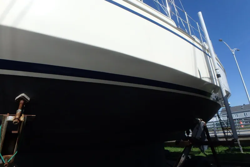 Si J'avais Su Yacht Photos Pics Custom Gilbert Caroff Lex Eterna 47 sailboat, 2017 model, on dry dock under clear sky.