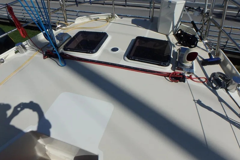 Si J'avais Su Yacht Photos Pics Deck of 2017 Custom Gilbert Caroff Lex Eterna 47 sailboat with hatches and rigging.