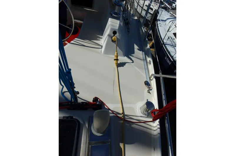 Si J'avais Su Yacht Photos Pics Deck view of 2017 Custom Gilbert Caroff Lex Eterna 47 sailboat with ropes and equipment.