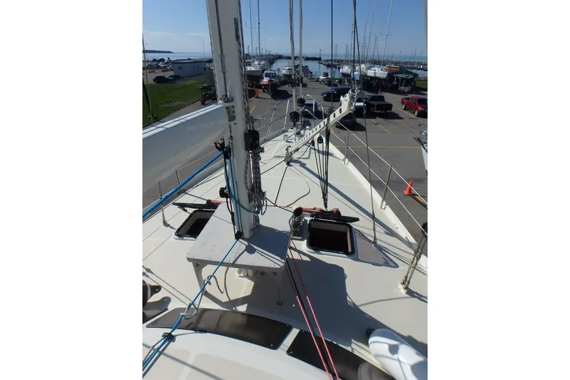 Si J'avais Su Yacht Photos Pics Sailboat deck view of 2017 Custom Gilbert Caroff Lex Eterna 47 in marina setting.
