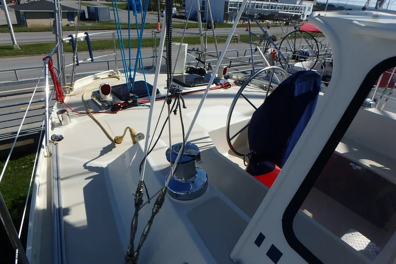 Si J'avais Su Yacht Photos Pics Cockpit of 2017 Custom Gilbert Caroff Lex Eterna 47 sailboat with steering wheel and rigging.