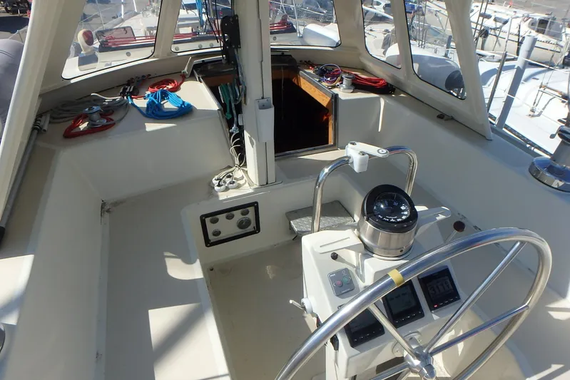 Si J'avais Su Yacht Photos Pics Cockpit of 2017 Custom Gilbert Caroff Lex Eterna 47 sailboat with navigation instruments.