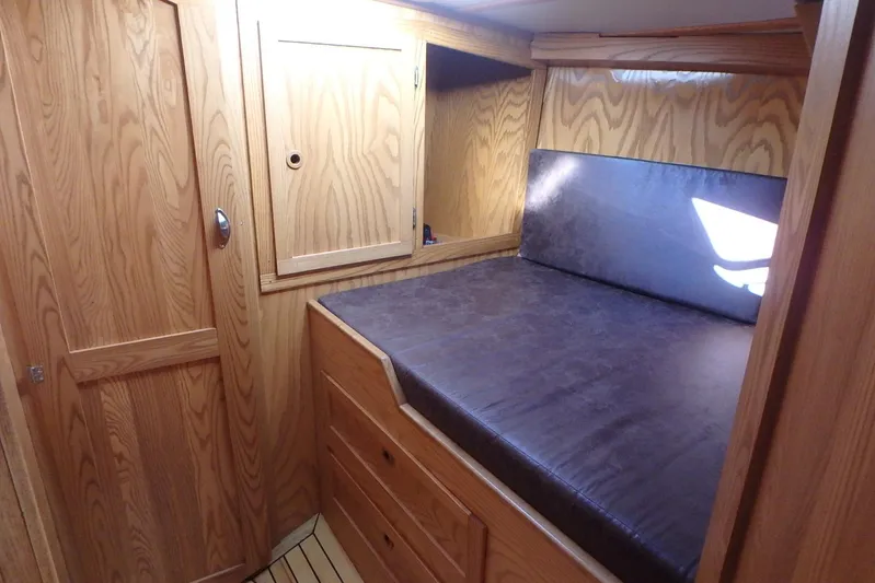 Si J'avais Su Yacht Photos Pics Cozy wooden cabin interior of 2017 Custom Gilbert Caroff Lex Eterna 47 yacht.