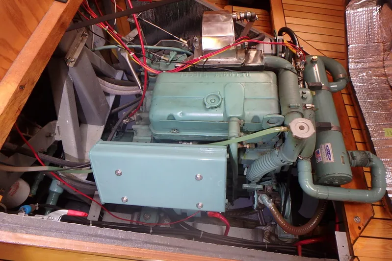 Si J'avais Su Yacht Photos Pics Engine compartment of 2017 Custom Gilbert Caroff Lex Eterna 47 sailboat, showcasing detailed machinery.