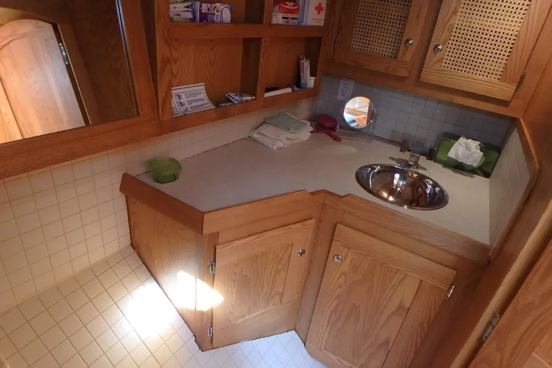 Si J'avais Su Yacht Photos Pics Wooden bathroom interior of 2017 Custom Gilbert Caroff Lex Eterna 47 yacht.