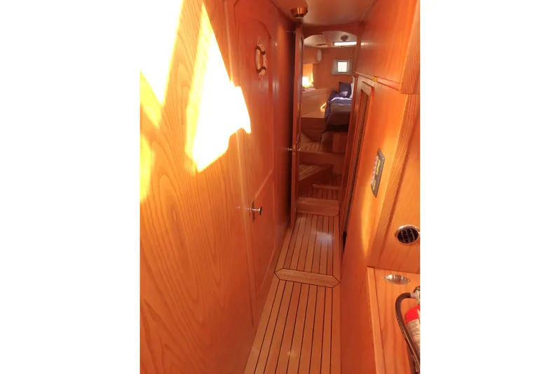 Si J'avais Su Yacht Photos Pics Interior of 2017 Custom Gilbert Caroff Lex Eterna 47 yacht with wooden finish.