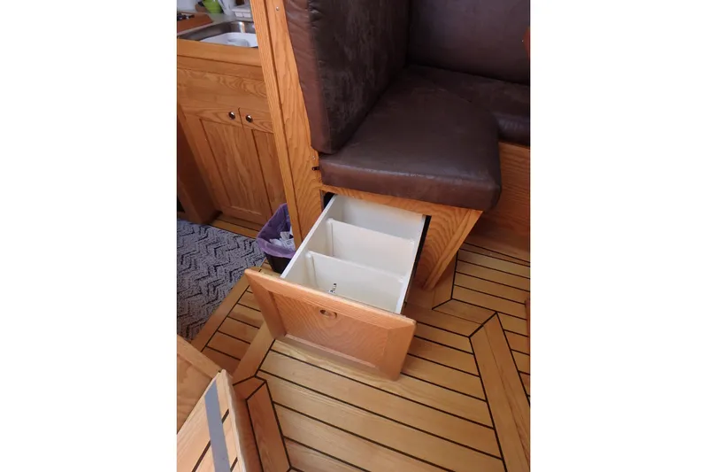 Si J'avais Su Yacht Photos Pics Wooden interior with pull-out storage in 2017 Custom Gilbert Caroff Lex Eterna 47.